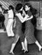 Vietnam: Taxi dancers dancing together at the Arc-en-Ciel Club on Jaccareo Road, Cholon, c. 1952