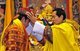 Bhutan: His Majesty Jigme Singye Wangchuck (1955 -), 4th Druk Gyalpo or 'Dragon King' (r. 1972-2006) crowning his son Jigme Khesar Namgyel Wangchuk (1980 -) 5th Druk Gyalpo in 2008